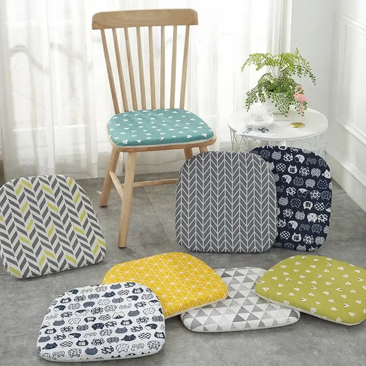 A collection of six patterned cotton hemp chair cushions in various colors for dining chair seating by decorbites