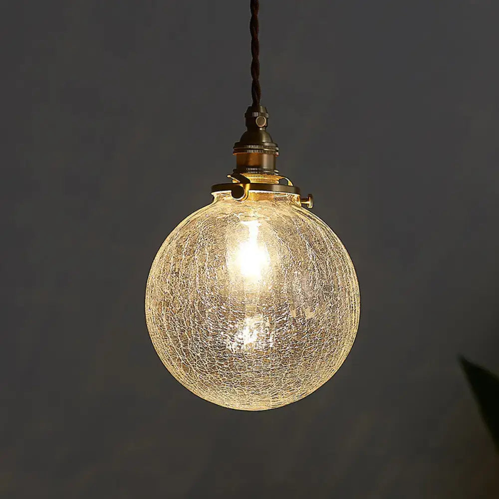Decorbites pauline modern industrial sphere ceiling light with warm glowing crackled glass and brass hardware for living room