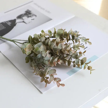 Peach and green eucalyptus leaves artificial arrangement with delicate synthetic soft green and muted pinkish leaves for decorbites eucalyptus leaves decor