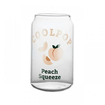 Clear glass cup shaped like a soda can with peach fruit prints and beige coolpop lettering for dining room use