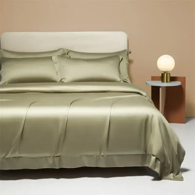 Peach satin cooling cotton solid bedding set in green with matching pillows and smooth glossy finish for bedroom