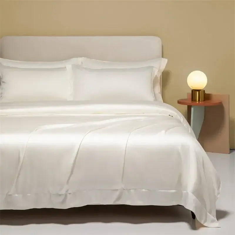 White satin bedding set with smooth glossy finish and subtle sheen in cooling cotton solid for bedroom use