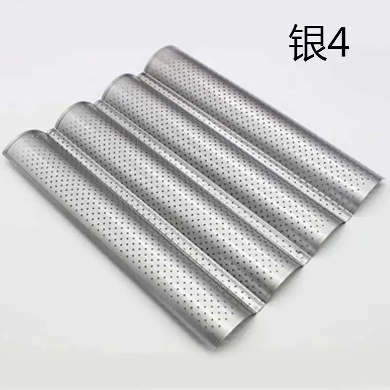 Silver-colored perforated metal wave bread pan with wavy design and four parallel channels for baking bread