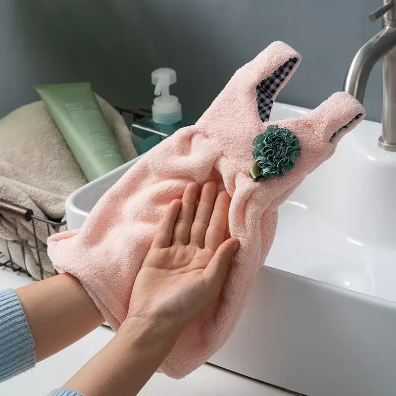 Pink plush hand towel with green floral embellishment and checkered lining for decorbites kids cute dress use