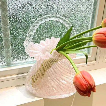 Translucent pink glass decorbites crystal flower basket vase with ruffled rim and vertical ribbed texture for living room decor