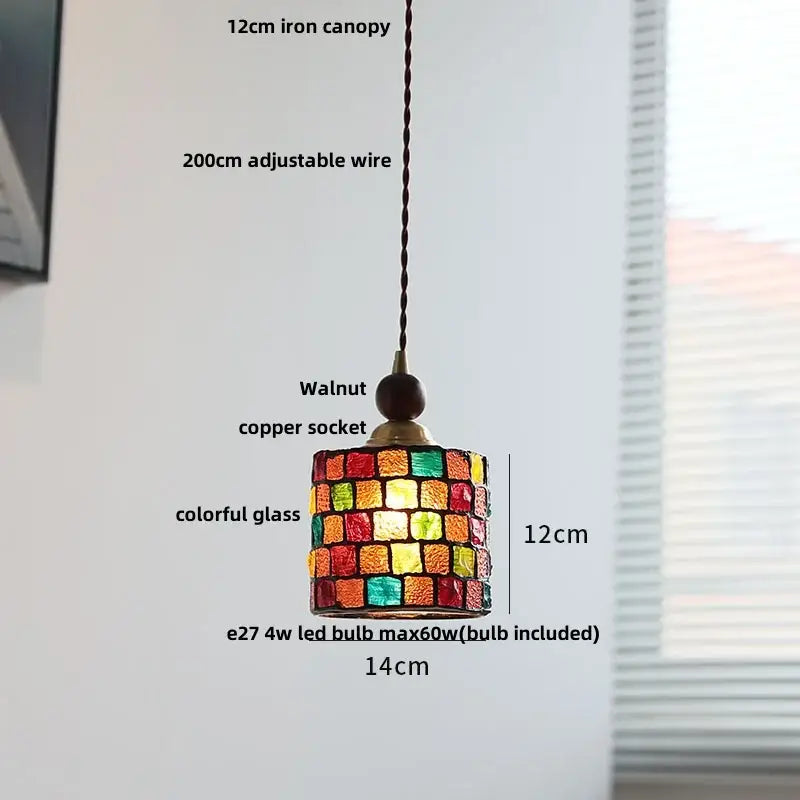 A vibrant 12cm pink and lavender decorbites glass ball led pendant light with mosaic panels and walnut-finished copper socket
