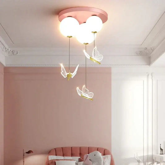 Pink and white butterfly ball ceiling lamp with three glowing globe bulbs and delicate pendant lights for bedroom decorbites butterfly ball