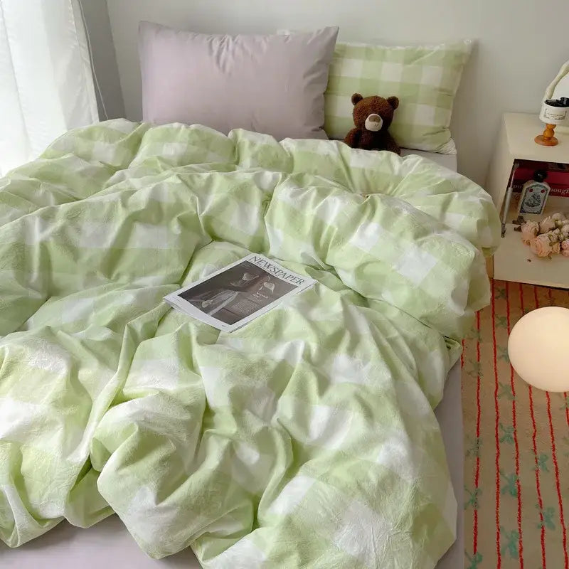 A soft mint green and white checkered cozy cotton grid duvet cover from decorbites cozy cotton bedding sets