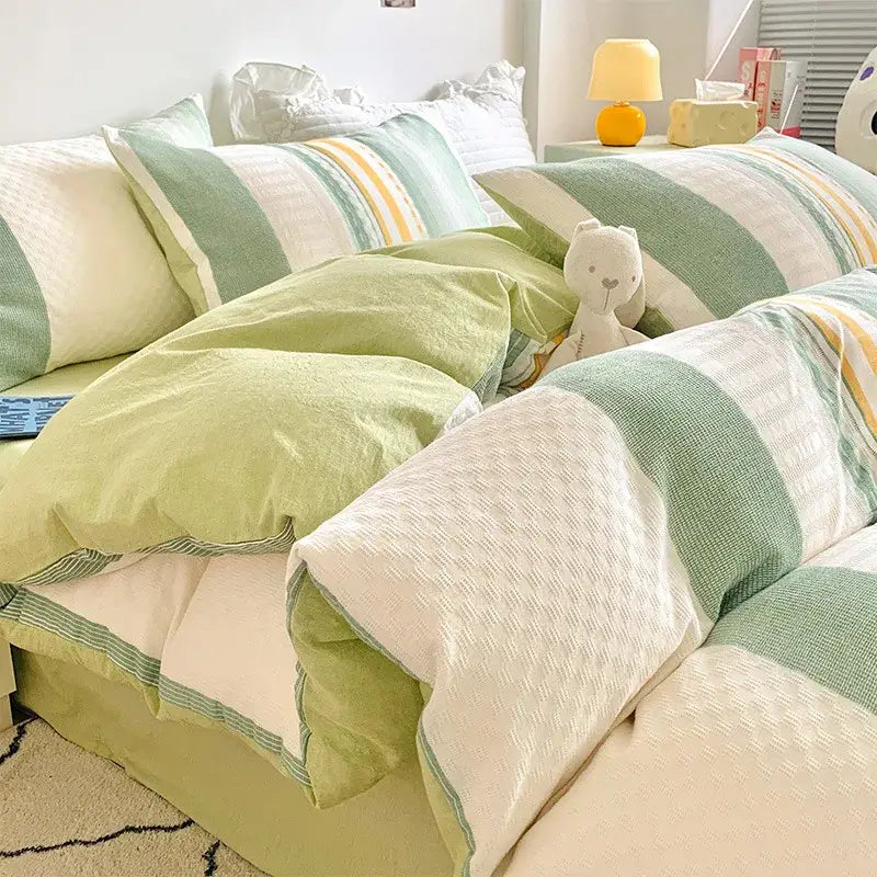 Cozy mint green and cream striped decorbites cotton jacquard bedding set with soft textured fabric finish