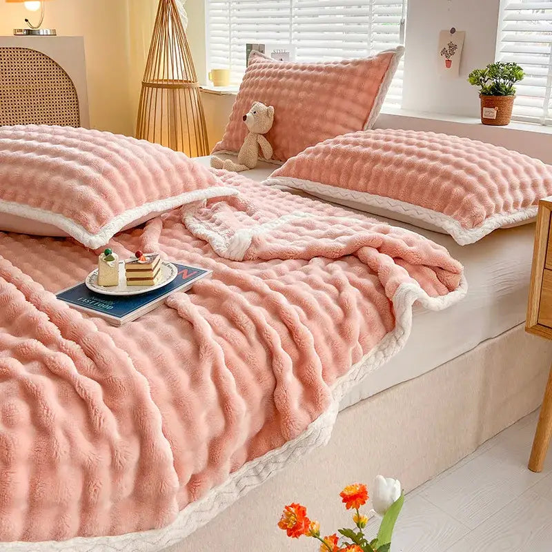 Pink and white textured cozy faux rabbit fur throw blanket with wavy pattern and fleece trim for bedroom decorbites cozy faux