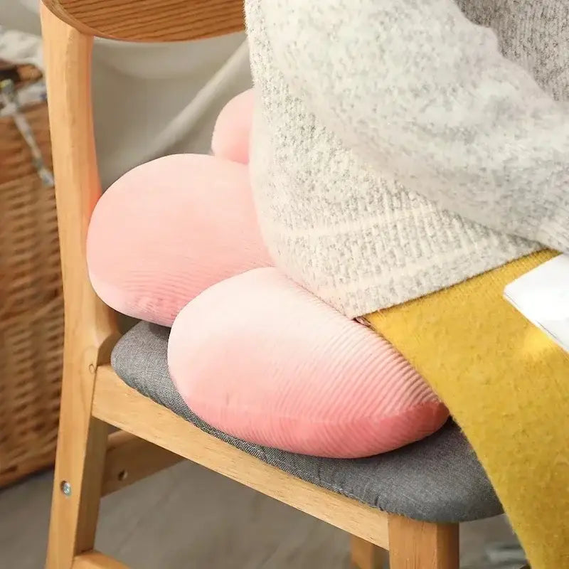 Pink corduroy peach-shaped cushion for lumbar support featured in decorbites daisy lumbar flower decor