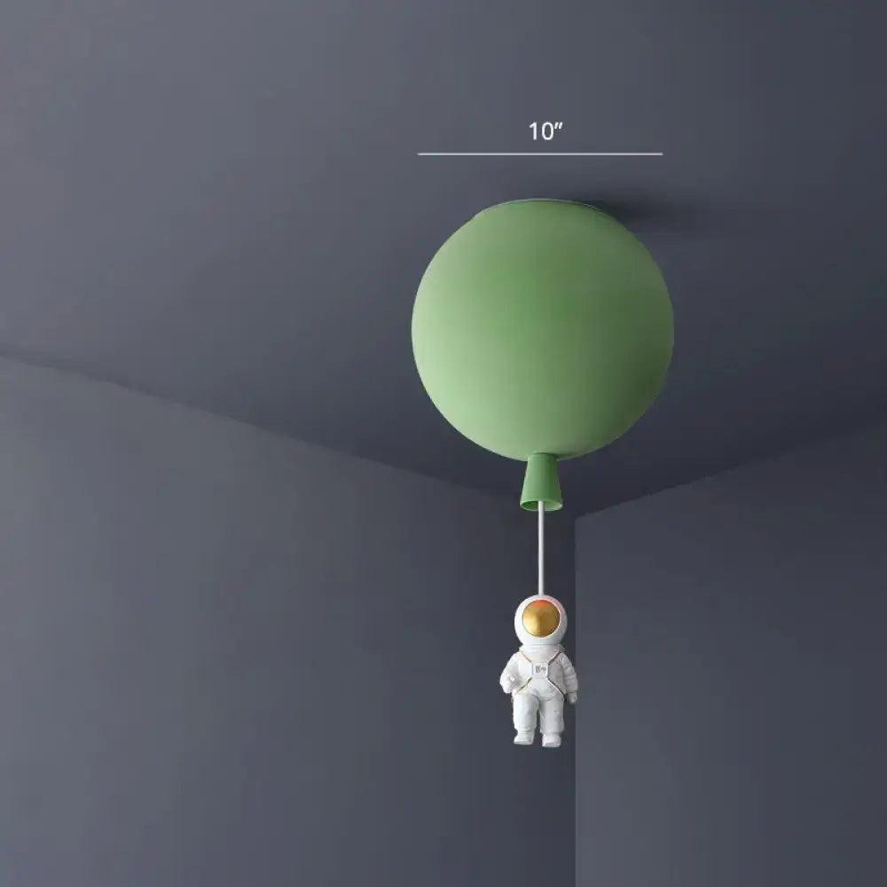 Matte sage green acrylic pendant light ceiling lamp with dangling astronaut figurine ideal for kids bedroom