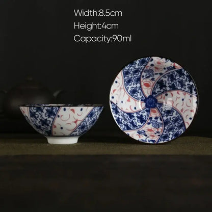 A delicate blue white porcelain hand-painted bowl and saucer with intricate floral patterns from decorbites