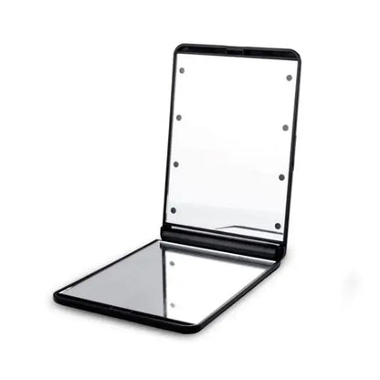 Black foldable led vanity mirror with lights along the frame for compact bedroom makeup use