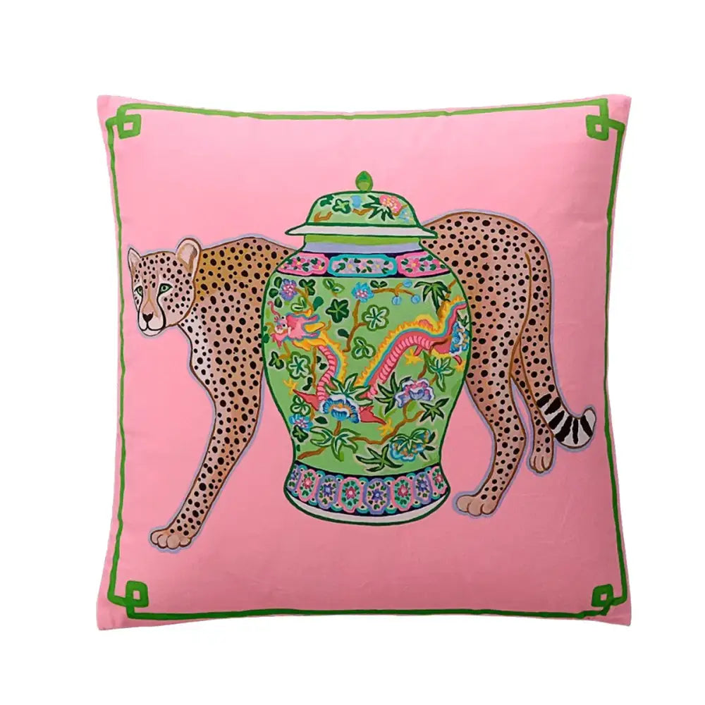 Pink lumbar pillow cover featuring a green porcelain jar with floral and dragon motifs and two spotted cheetahs for blue lion dog decor