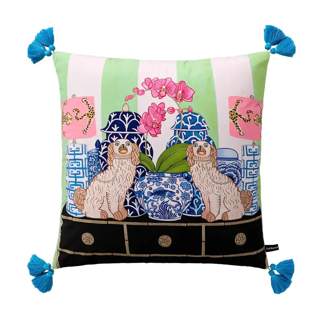 A pink and blue lion dog lumbar pillow cover featuring fluffy dogs and blue lion dog vases with turquoise tassels