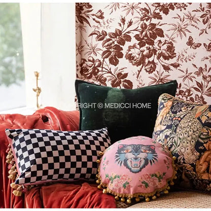 Pink circular velvet throw pillow case with embroidered tiger face floral pattern and gold pom-poms decorbites cat print