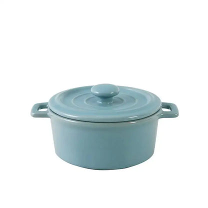 A sleek light blue enameled cast iron dutch oven with lid and handles for decorbites ceramic mini soup cookware
