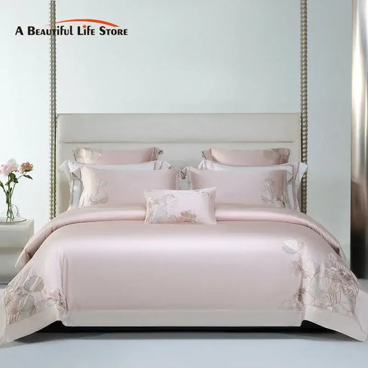Pink satin bedding set with delicate cotton flowers embroidery and satin finish for elegant bedroom decorbites decor