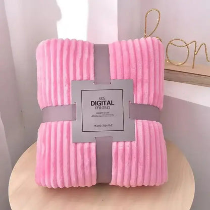 Pink cozy striped flannel fleece bedroom throw blanket with soft pink corduroy texture wrapped in gray ribbon