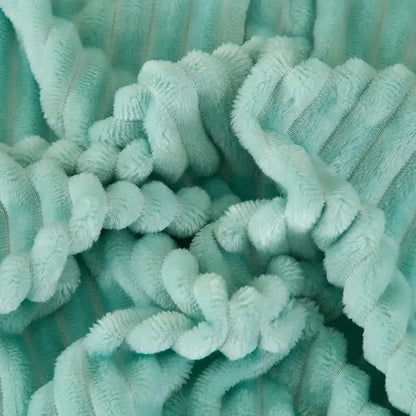 Soft mint-green corduroy fabric with plush texture complements pink cozy striped flannel fleece bedroom throw decorbites cozy striped