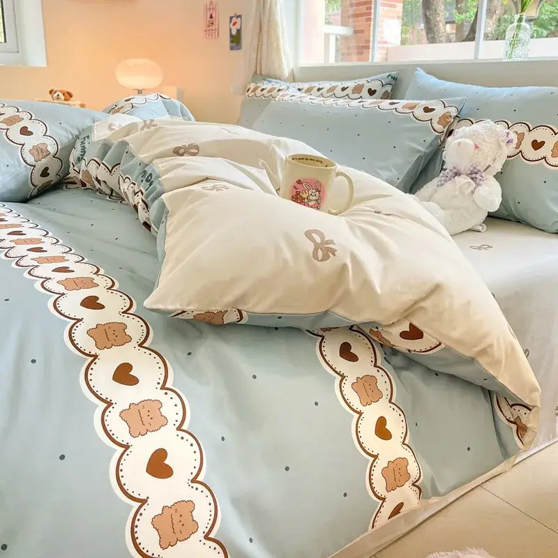 Pastel blue and cream bed set with heart and bow edges made of decorbites cotton cartoon printed fabric