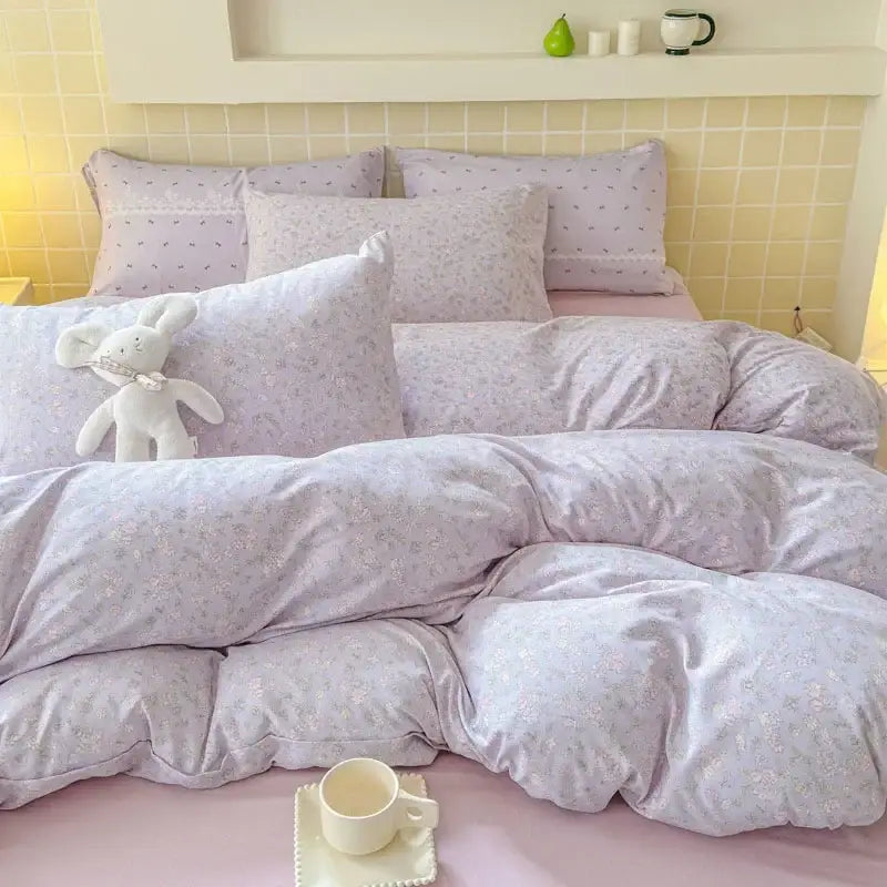 Lavender floral-patterned bedspread set with soft plush fabric and subtle pastel detailing double layer yarn design