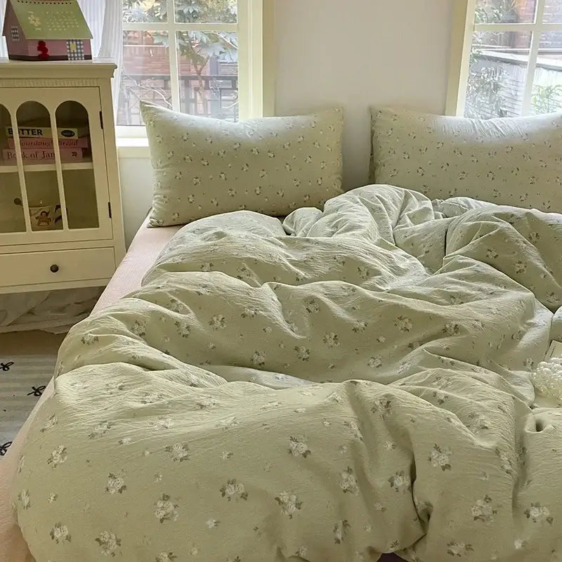 Soft mint green floral printed cotton duvet cover set with matching pillowcases in a pink floral double layer yarn bedspread set