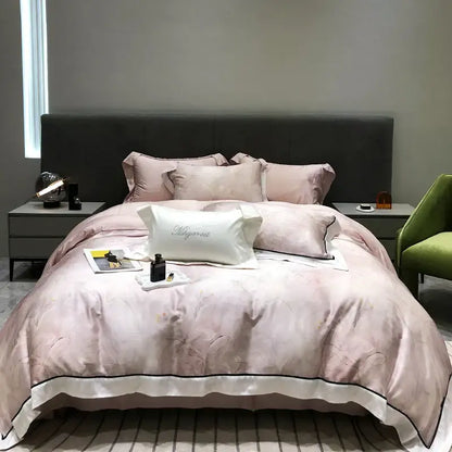 Pink satin duvet set with black piping and silver embroidered pillow from decorbites eucalyptus lyocell flowers collection
