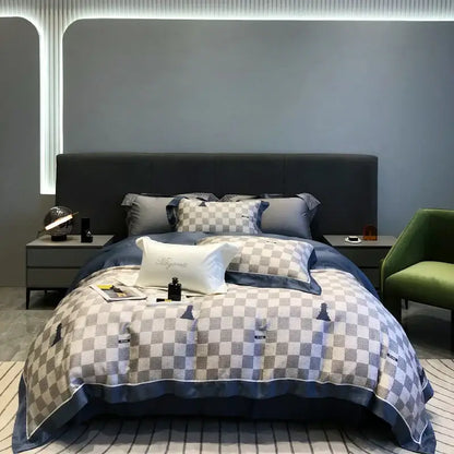 Blue and gray checkered duvet set with satin trim from the decorbites eucalyptus lyocell flowers collection