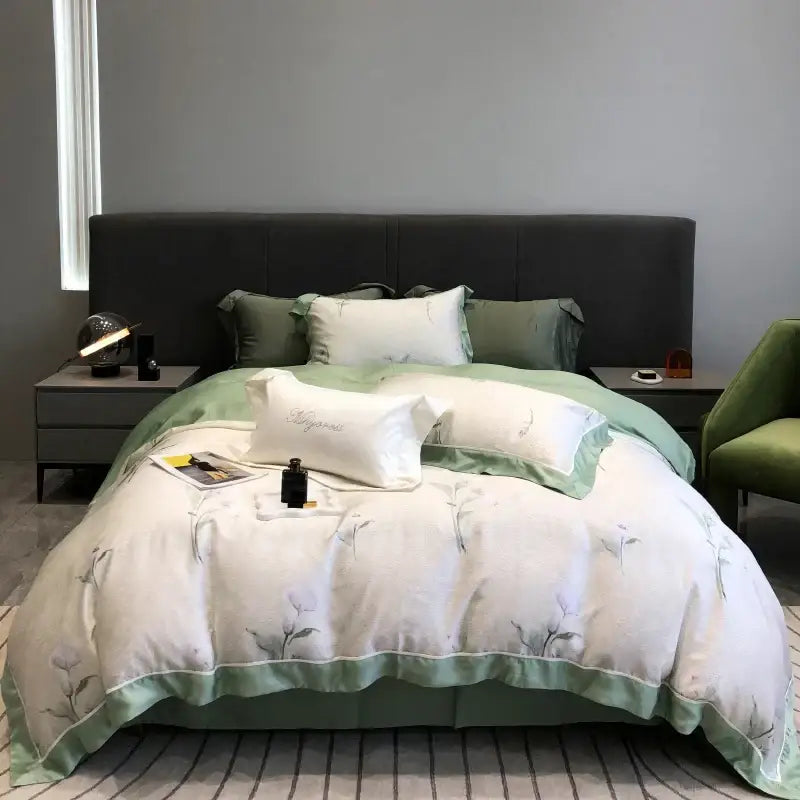 Soft white and sage green floral-patterned duvet set with delicate embroidery made from decorbites eucalyptus lyocell flowers