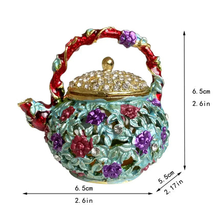 Pink floral heart jewelry trinket box shaped like a turquoise enamel teapot storage case with rhinestones and gold hardware