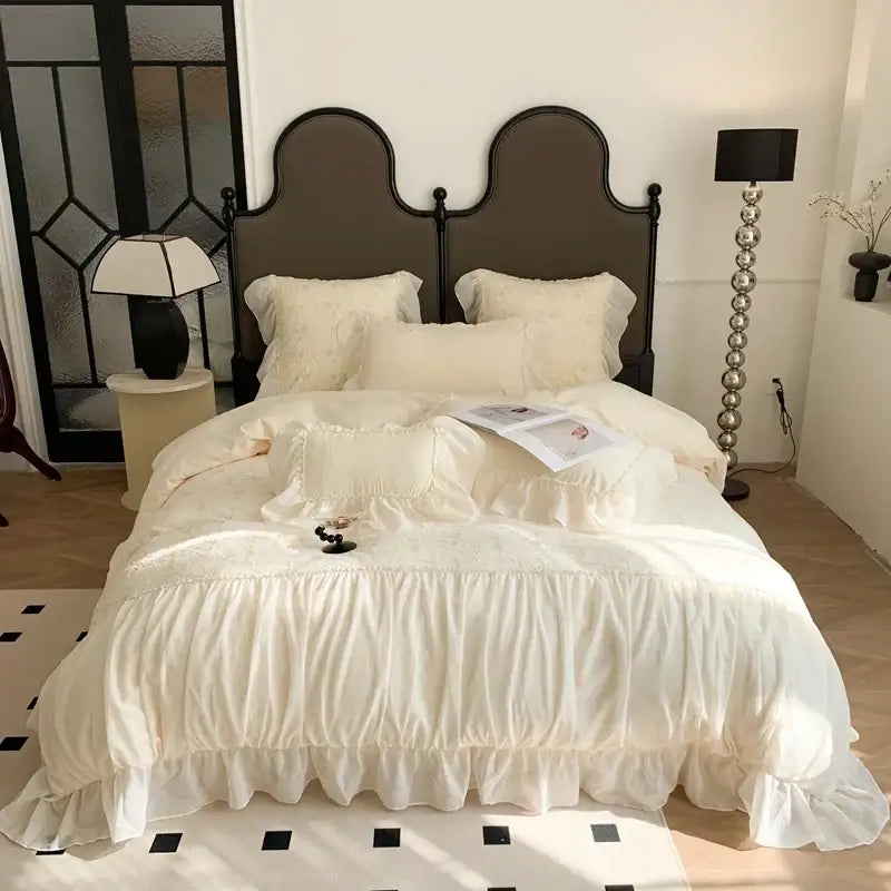 Cream-colored ruffled bedding set with soft textured fabric and delicate lace detailing for pink french princess decor