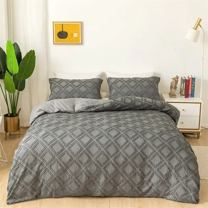 Gray quilted bedding set with diamond pattern complementing decorbites geometric cut flowers duvet cover design