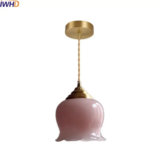 Pink glass copper led pendant light with gold-toned fixture and twisted cord for kitchen decor or lighting