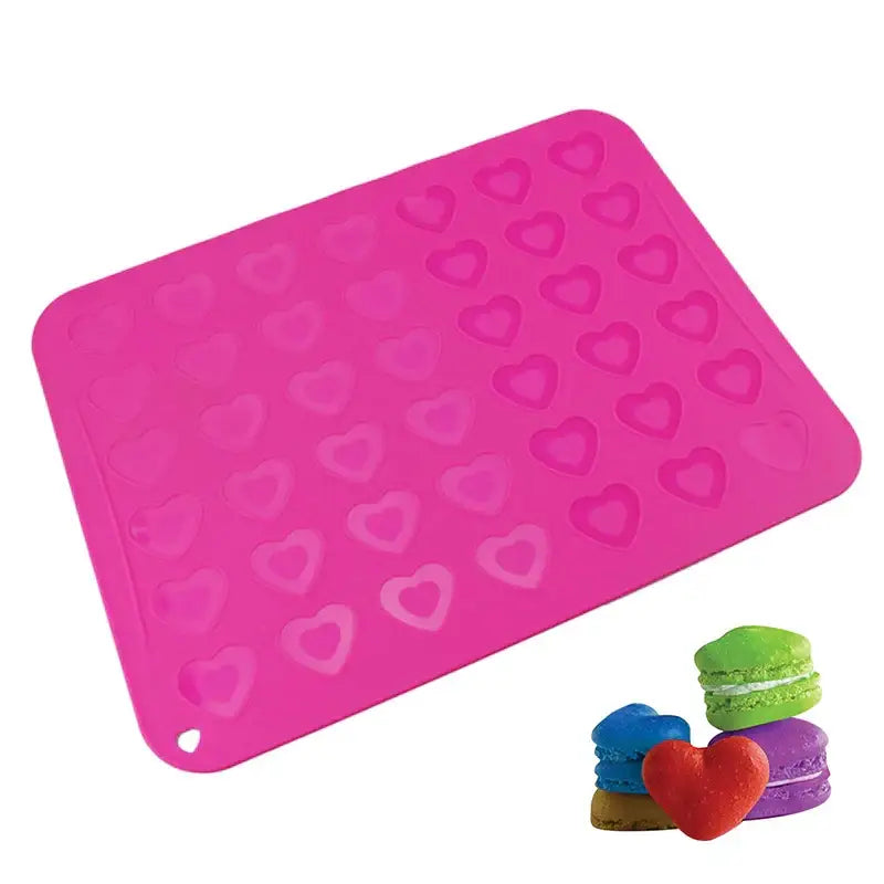 Pink heart silicone macaron baking mat by decorbites with heart-shaped molds for macaron baking and cookie baking use