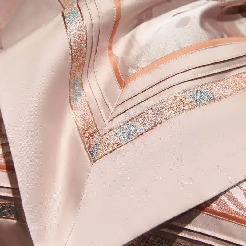 Luxurious blush pink satin pillowcase with gold and teal embroidered trim in pink leopard print egyptian cotton bedding set decorbites