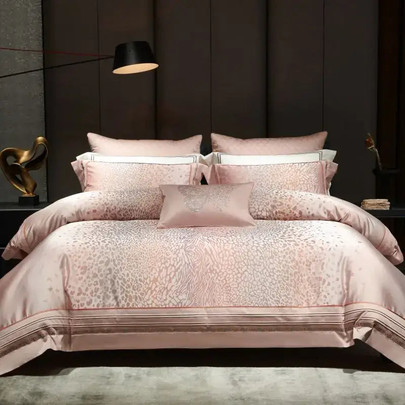 Pink satin egyptian cotton bedding set with subtle decorbites leopard print and elegant gold striped border
