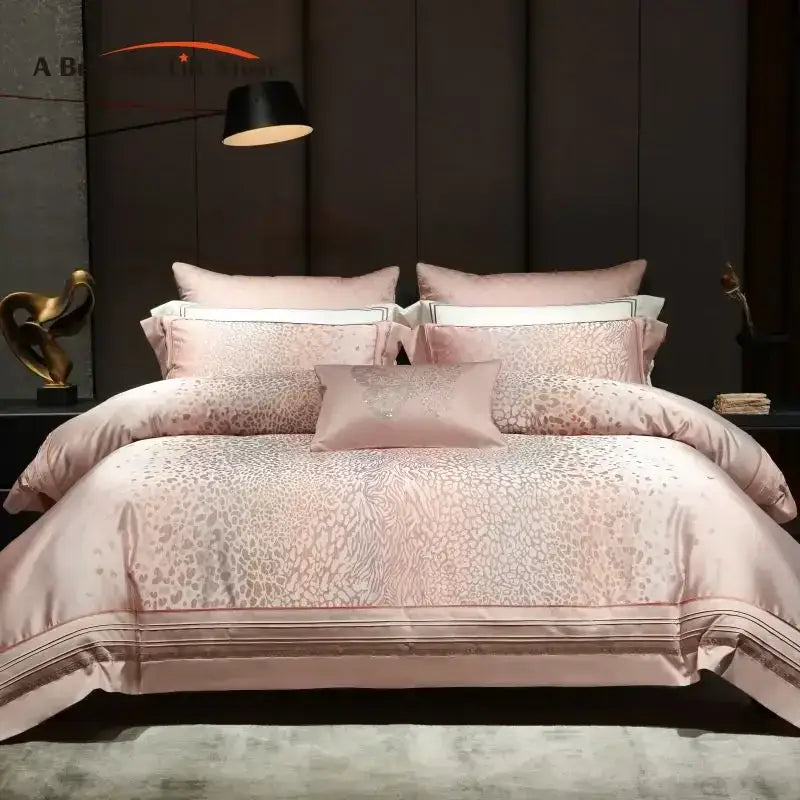Pink satin egyptian cotton bedding set with subtle decorbites leopard print and elegant gold trim for bedroom use