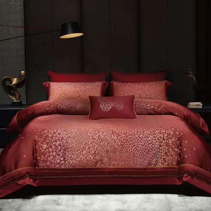 Luxurious burgundy satin egyptian cotton bedding set with decorbites leopard print and gold trim for elegant bedroom decor