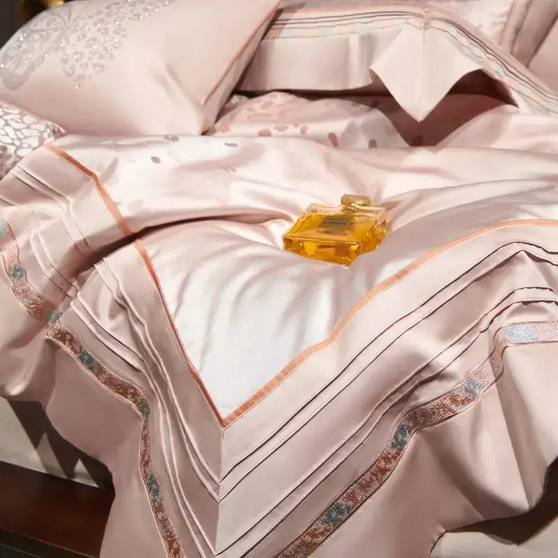 Luxurious blush pink satin bedding set with intricate embroidered borders gold-threaded piping egyptian cotton decorbites leopard print