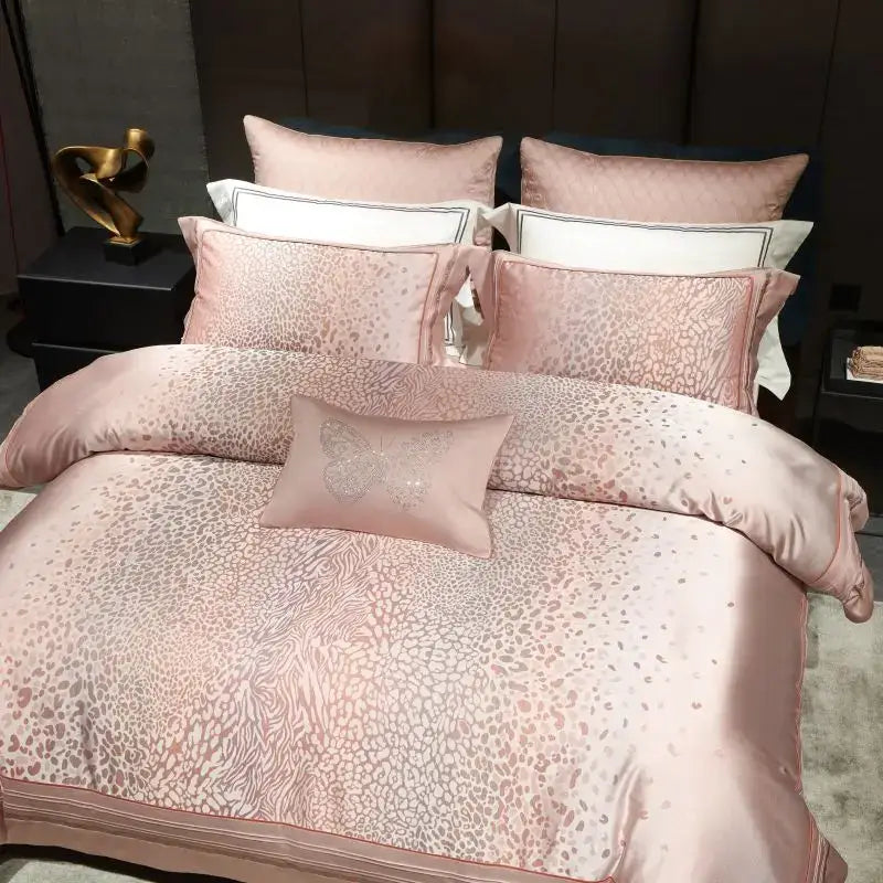 Pink satin egyptian cotton bedding set with subtle decorbites leopard print and embroidered butterfly accents