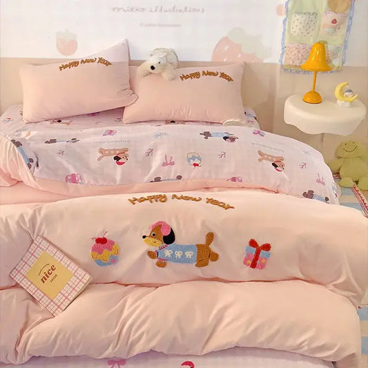 Pink new year dog cotton bedding set featuring embroidered dog, gift box, and cupcake appliqués for cozy decorbites cotton bedding