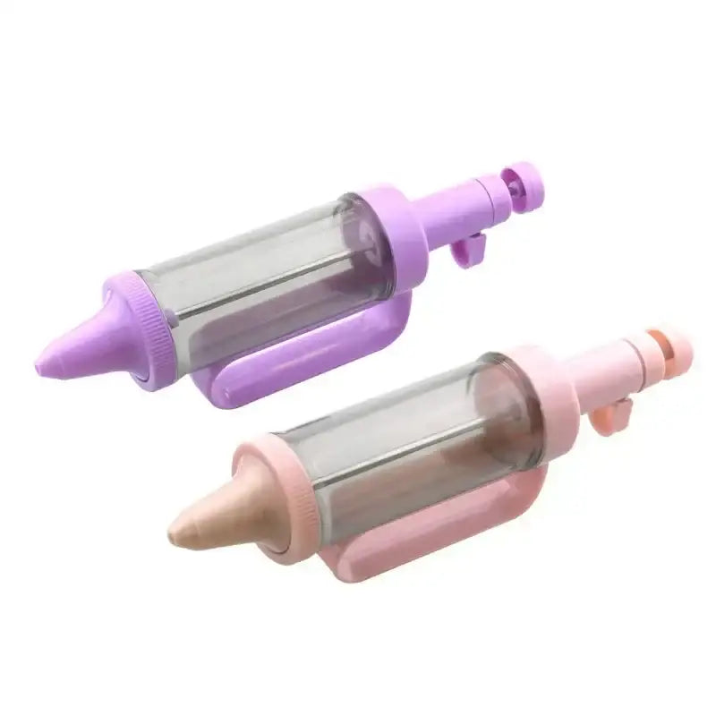 Pink plastic cream decorating gun set with two pastel silicone and clear plastic piping bags with adjustable nozzles