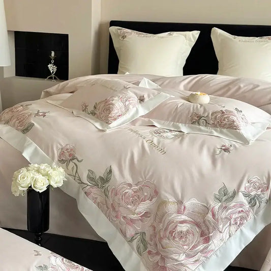 Delicate blush pink and cream floral embroidered bedding set with pink purple flowers on satin egyptian cotton fabric