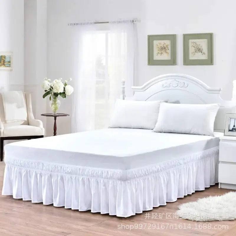 White ruffled elastic bed skirt with a smooth flowing fabric finish for bedroom soft wrap around use