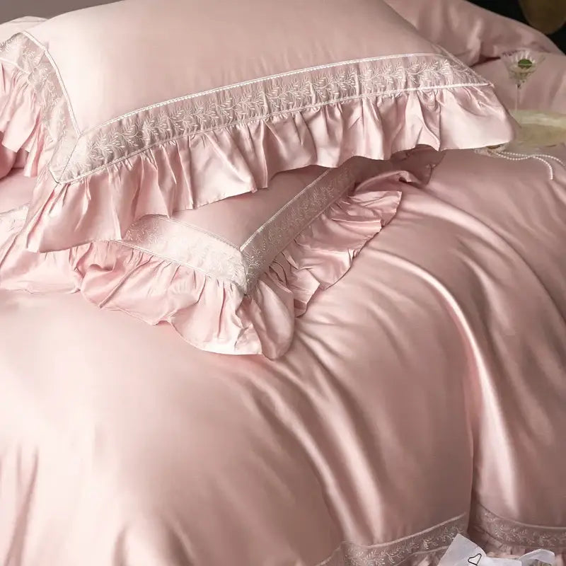 Pink satin 1000tc luxury embroidery bedding set pillowcases with delicate lace trim and ruffled edges by decorbites