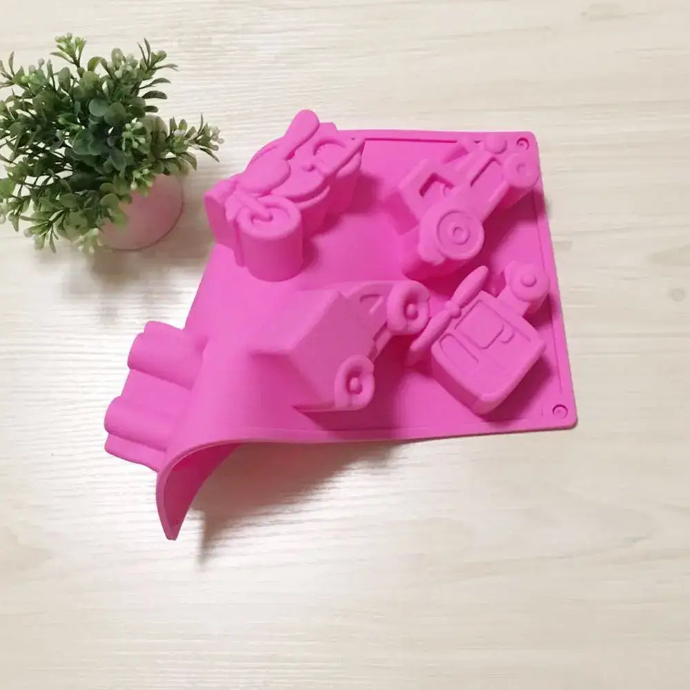 Pink silicone cake mould featuring creative airplane car and tractor shapes for decorbites creative airplane baking tool