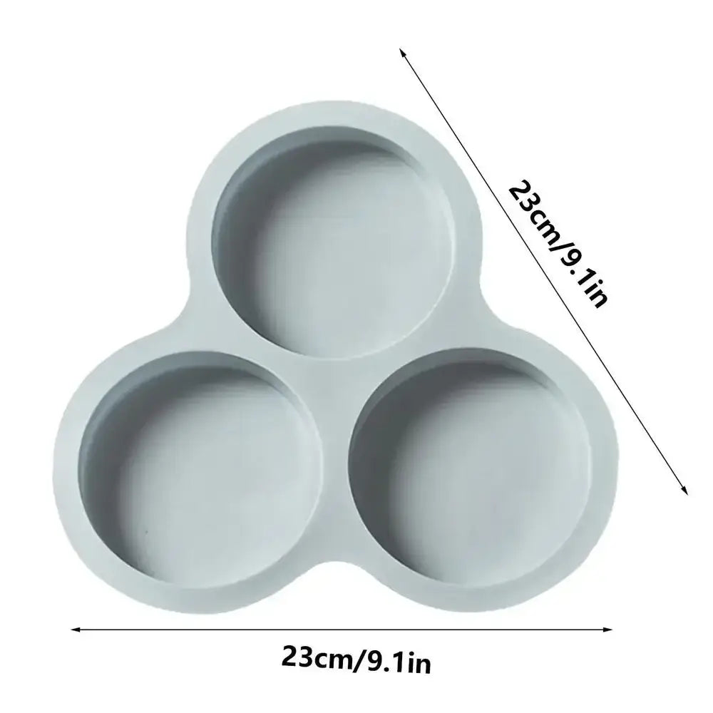 Light gray silicone three-compartment food tray designed as an egg mold pancake shaper for kitchen use