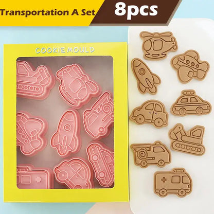 Set of eight pink and brown silicone truck cookie cutters shaped like various vehicles in a cookie cutters set